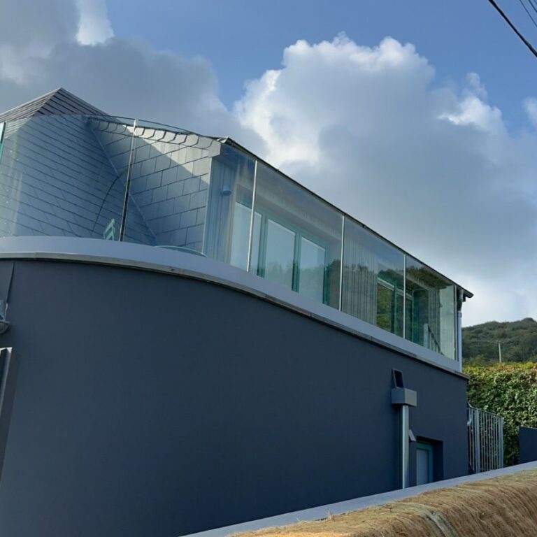 IMG-20240906-WA0069 Stunning frameless glass balustrade enhancing outdoor living space in West Wales.