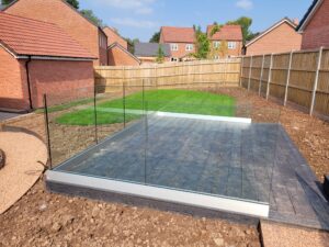 Frameless glass panels on a deck providing unobstructed views in Shropshire