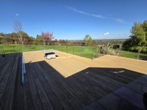 Side view showing clean lines of glass balustrades for outdoor decking