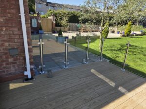 Side view showing clean lines of glass balustrades for outdoor decking
