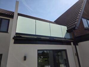 frosted glass balustrade for decking with frameless base channel