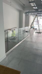glass balustrades for internal ramps – ramp barrier and wall rails installed in Birmingham