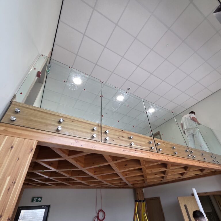 IMG-20250622-WA0023 frameless balustrade installation with boss fixings to timber fascia