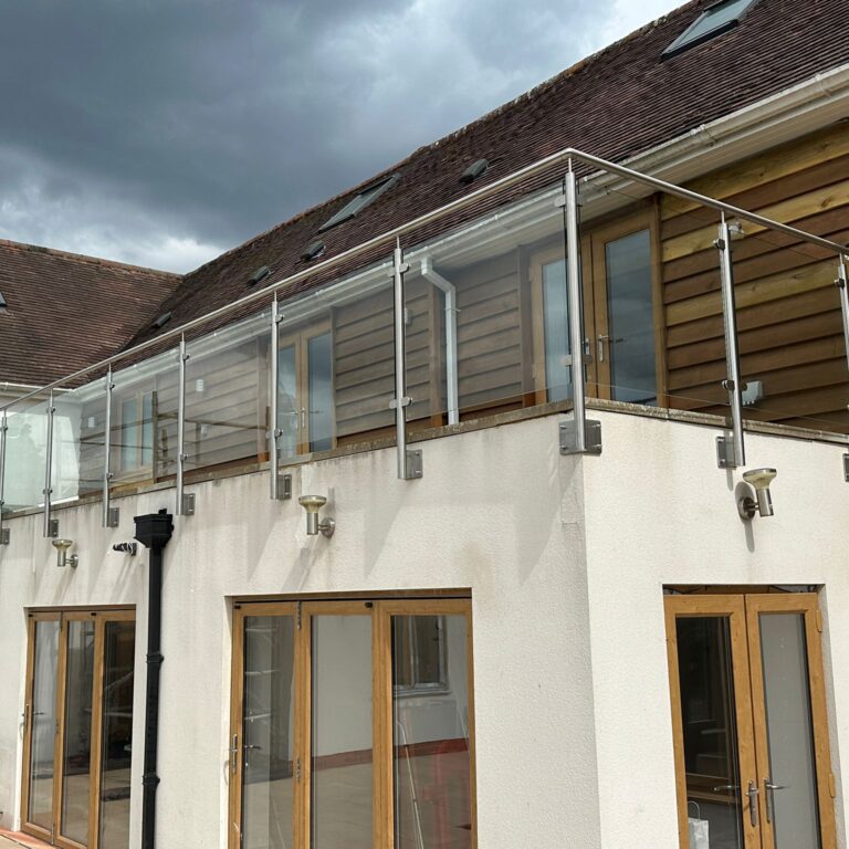 WhatsApp Image 2025-07-24 at 09.34.54_57e2334d side-fix stainless steel and glass balustrade on terrace edge