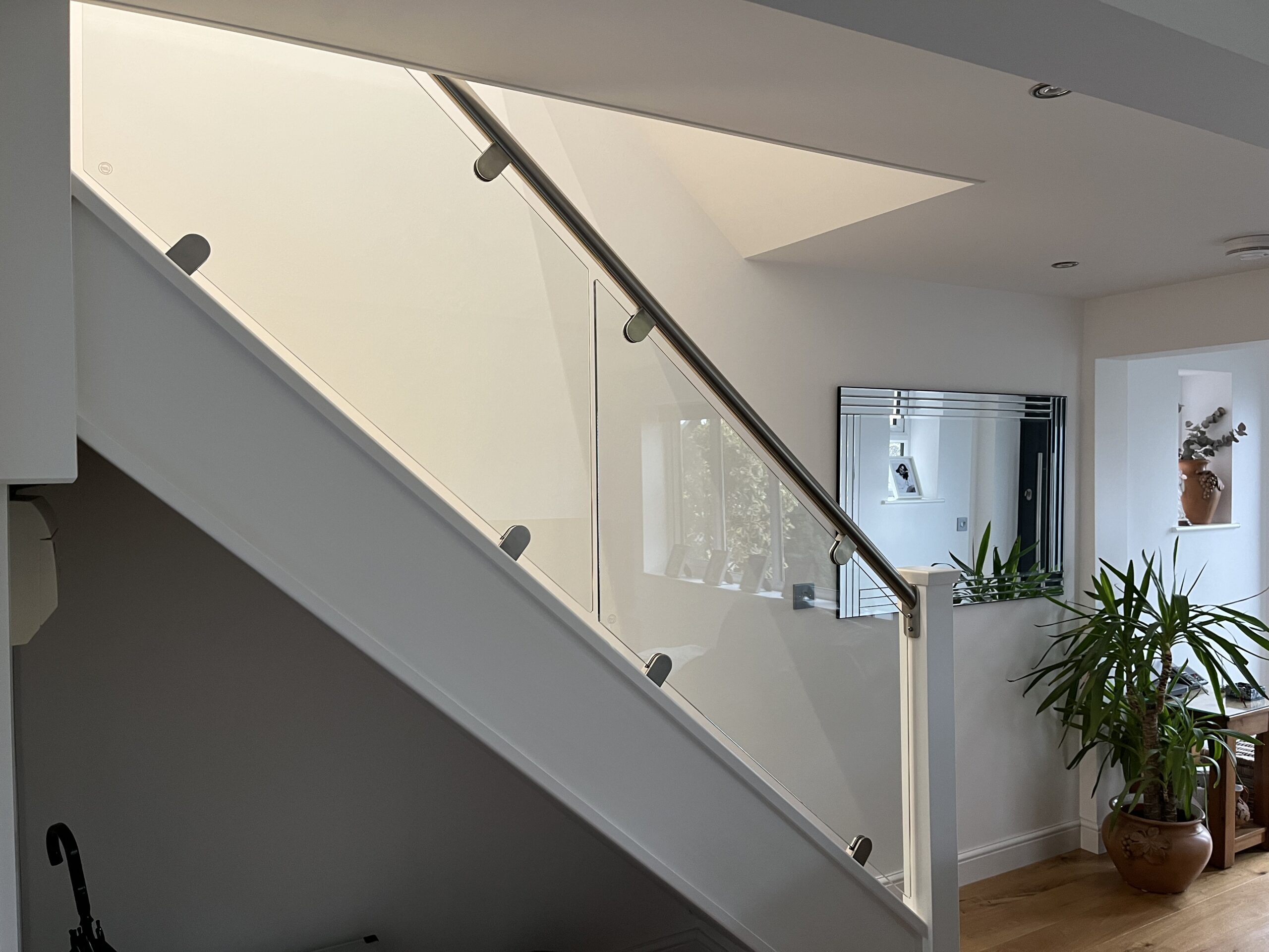 Staircases with Clamps 12 Staircase glass infill panels with stainless clamps
