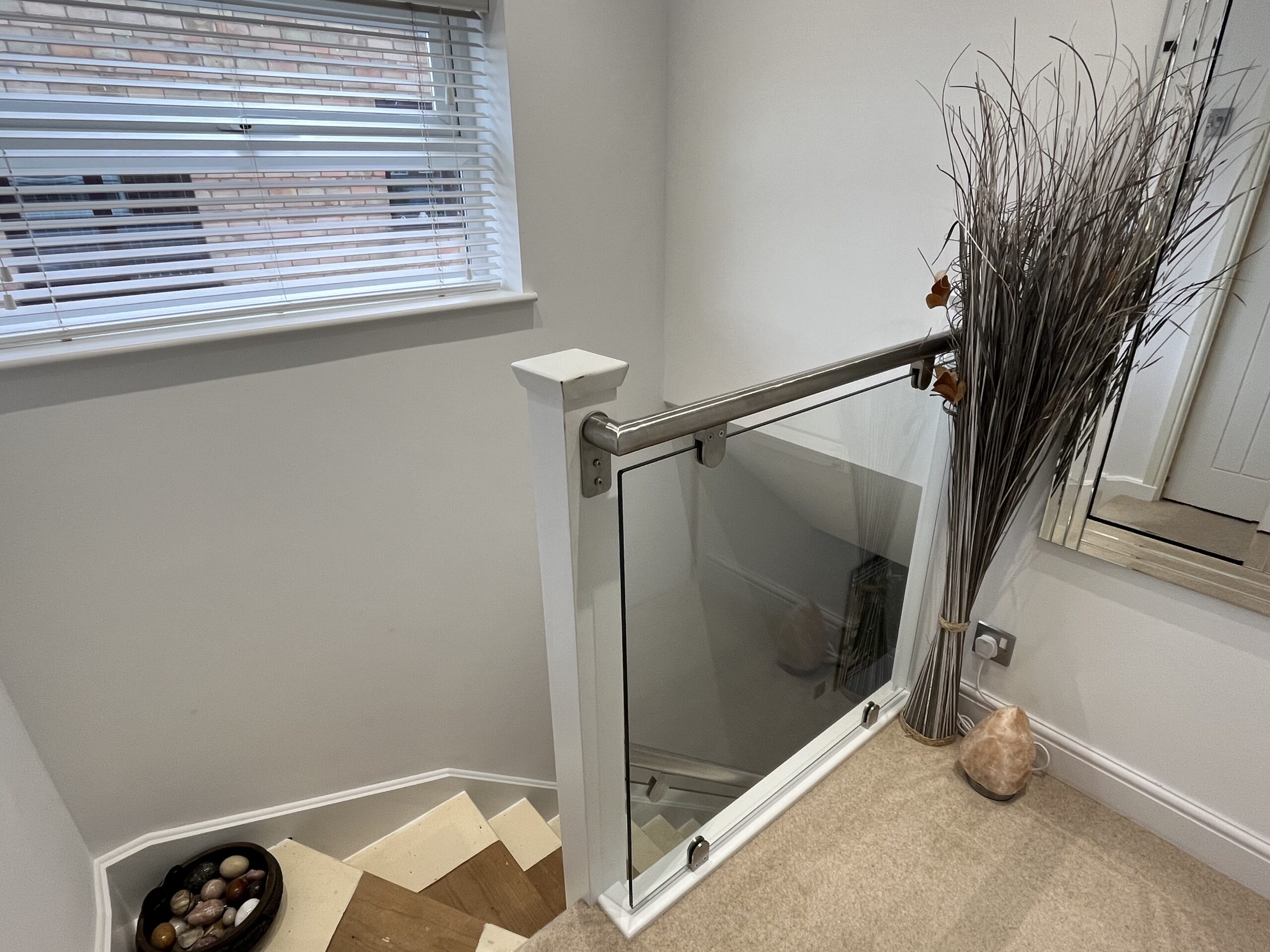 Staircases with Clamps 13 Glass banister infill on landing return