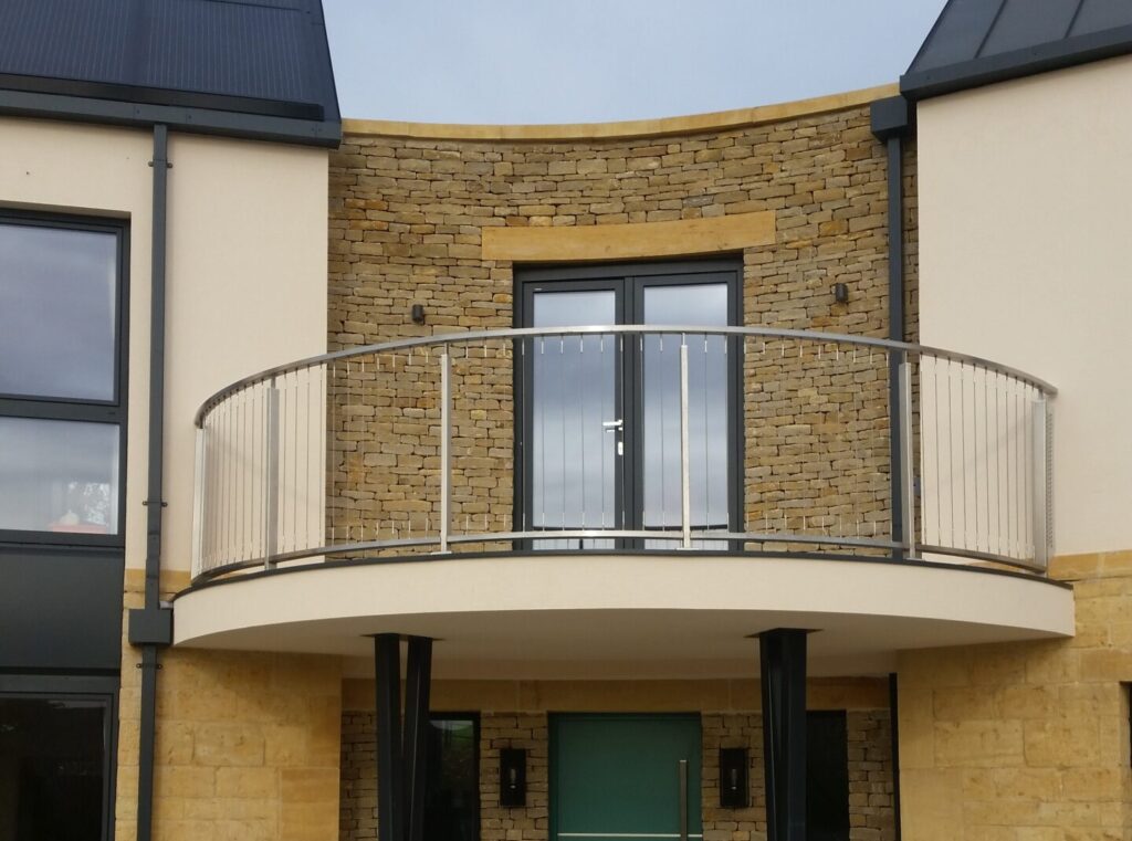 Curved vertical wire metal balustrade Curved vertical wire metal balustrade