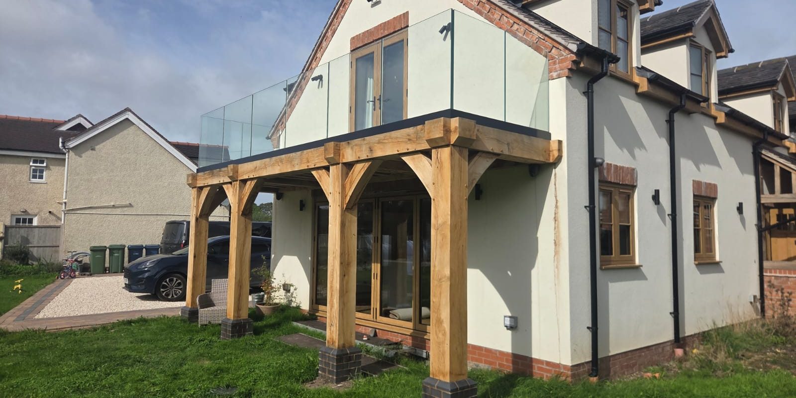 Frameless glass balustrade on a timber frame platform in the Midlands