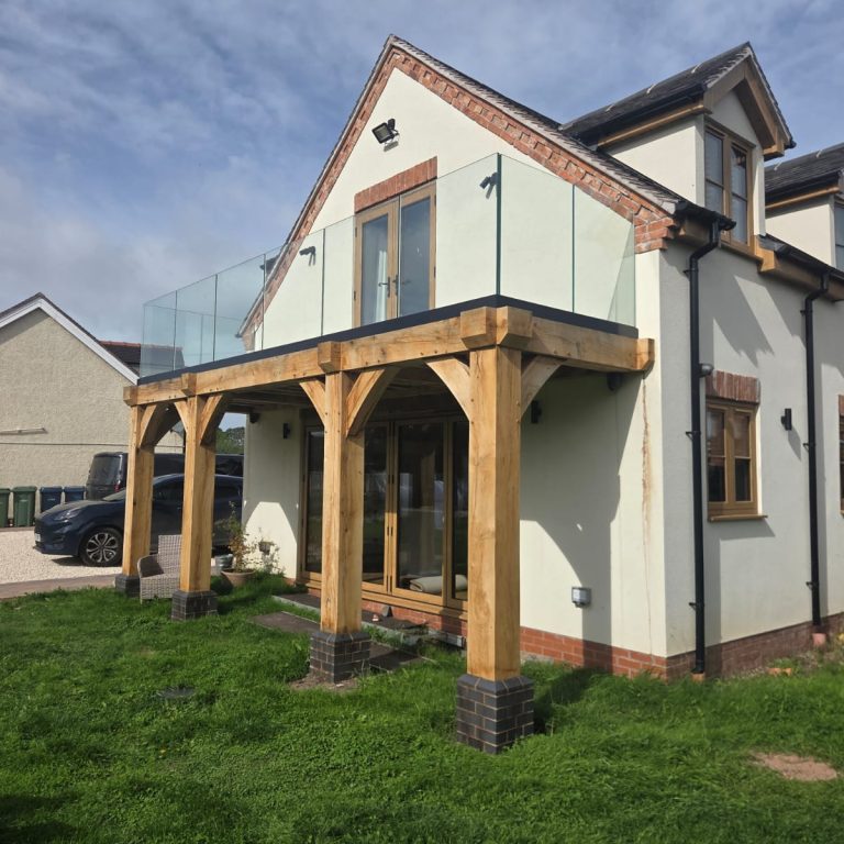 Frameless glass balustrade on a timber frame platform in the Midlands